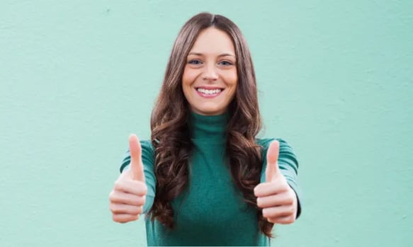 woman thumbs up